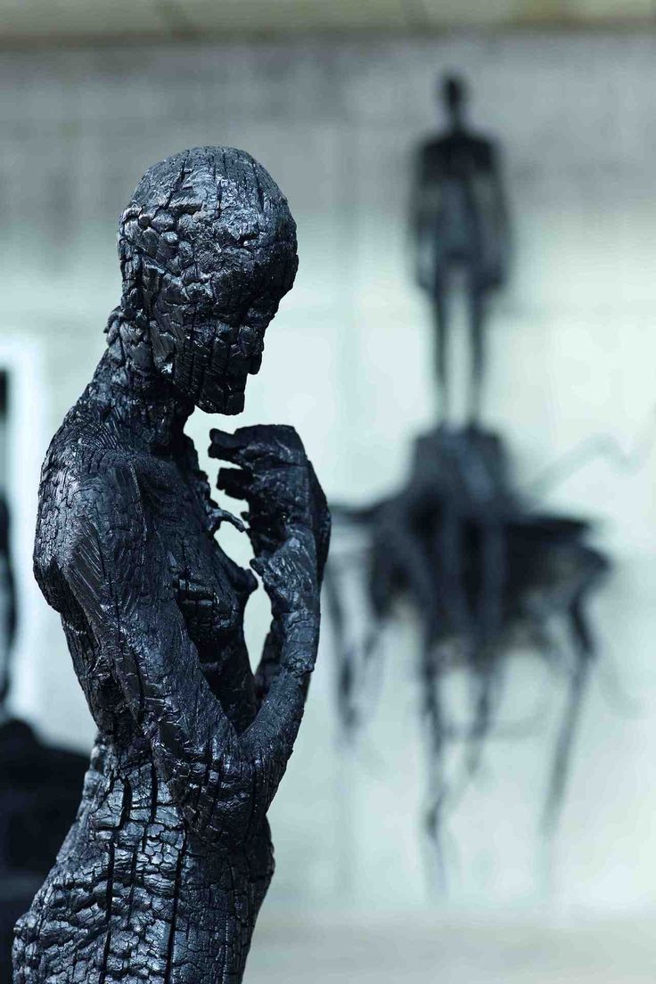 Charcoal sculptures by Aron Demetz